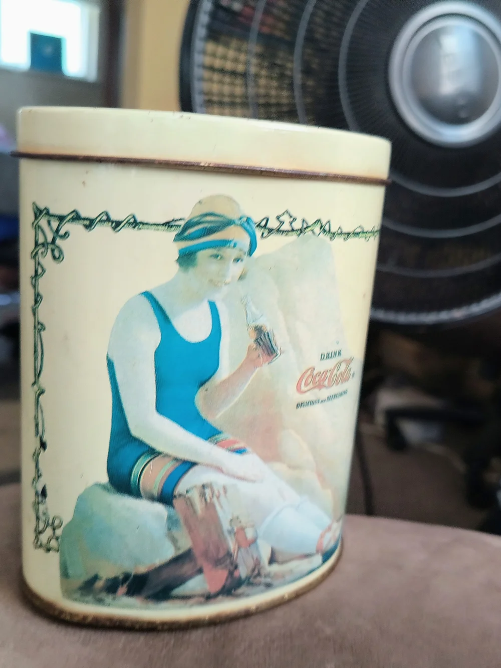 1989 Coca Cola Cream Tin with Teal Illustration